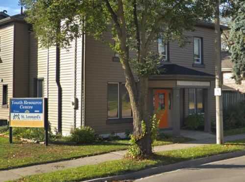 Youth Resource Centre building with an orange door.